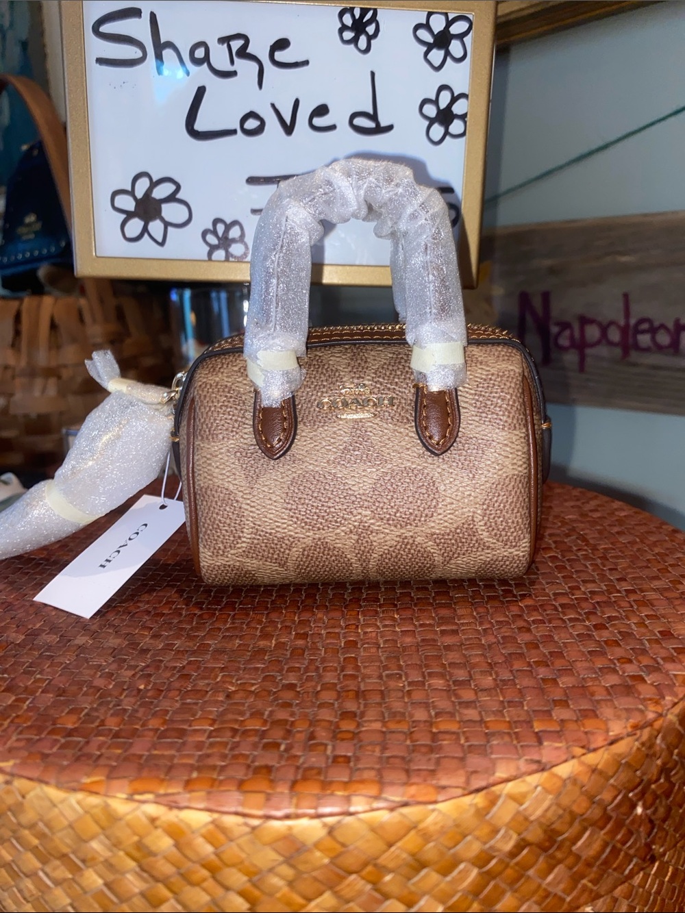 Coach Mini Rowan bag charm with signature canvas and cowhide leather details
